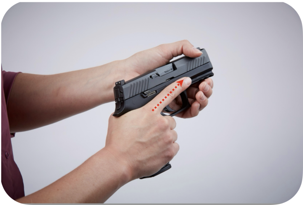 How to grip a pistol - Step 3 wrap middle through pinky fingers around front strap ensuring middle finger is touching the trigger guard
